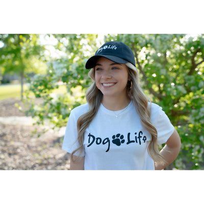 Young woman wearing white Dog Life tee shirt